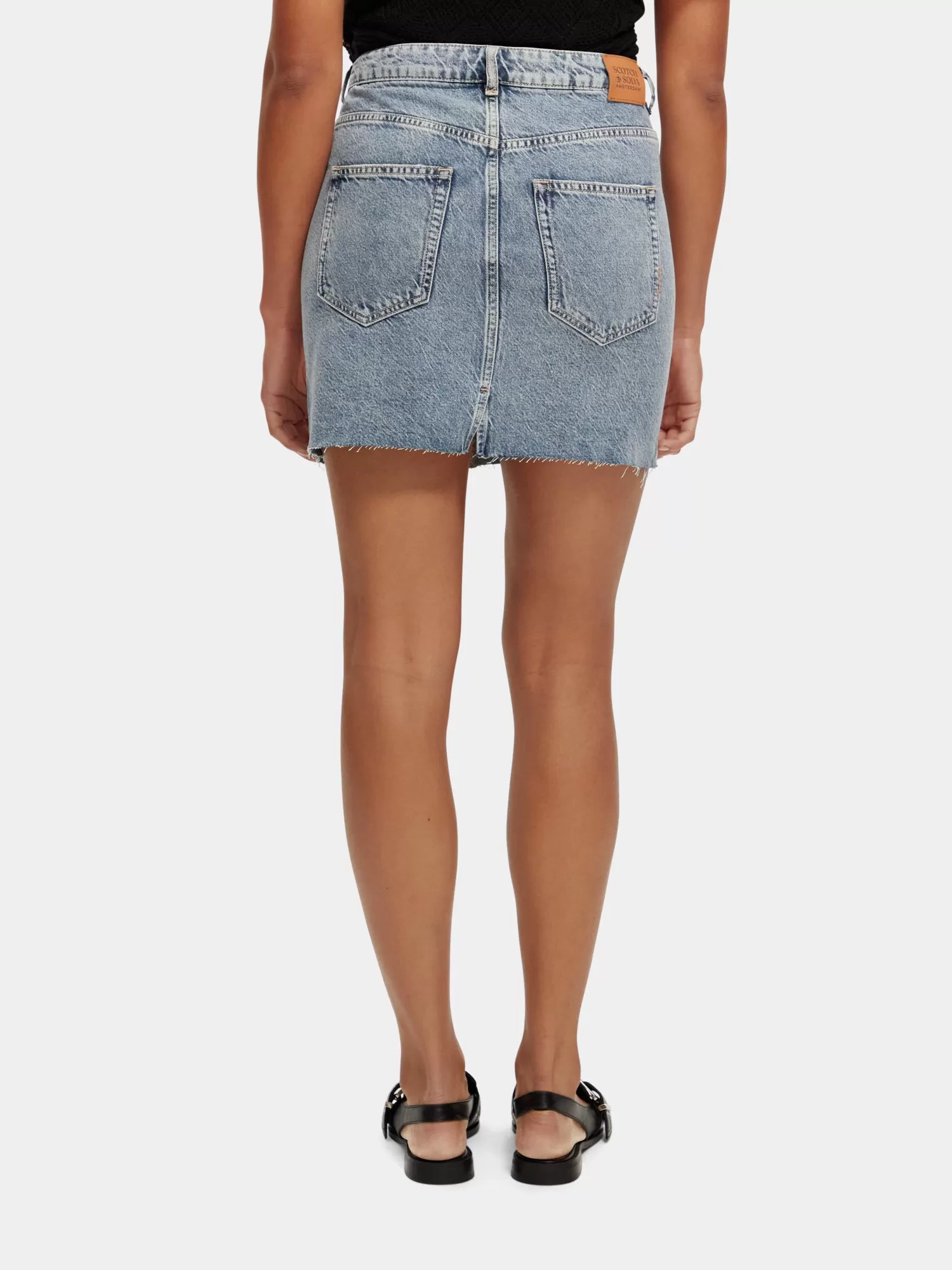 Cross over front washed denim mini skirt